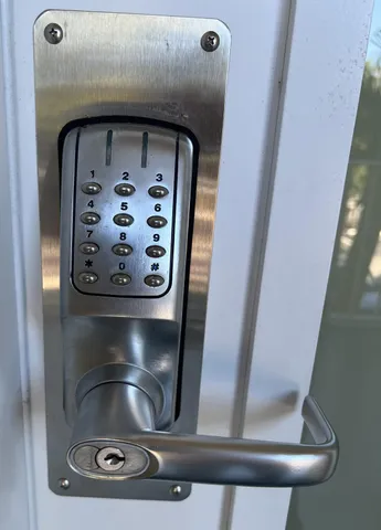 a yard with a house in background