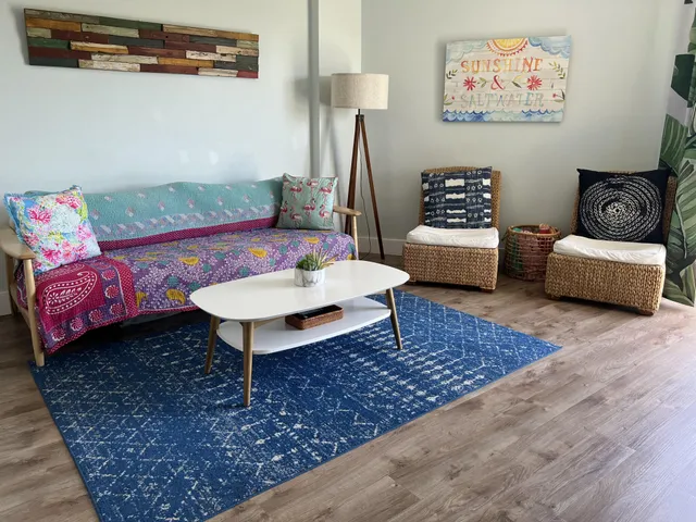 a living room with furniture and a couch