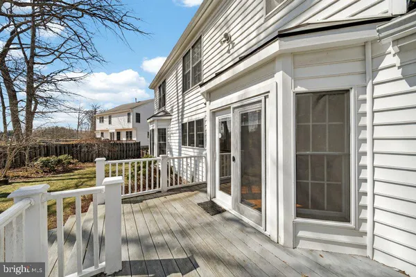 a view of a building with wooden floor and stairs