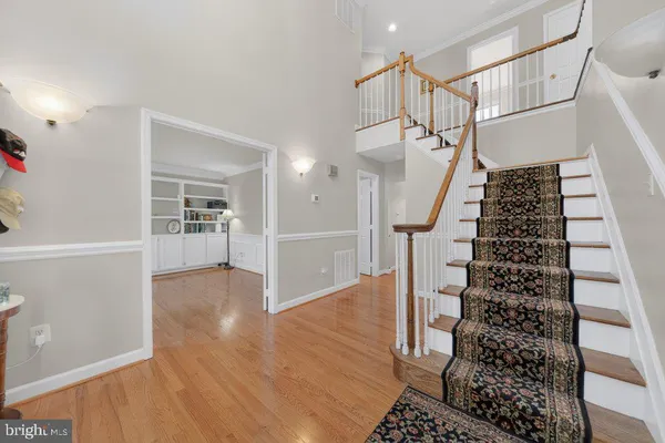 a view of entryway with wooden floor