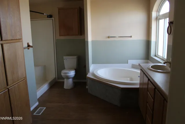 a bathroom with a sink and toilet