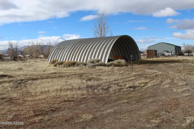 a view of backyard and entertaining space