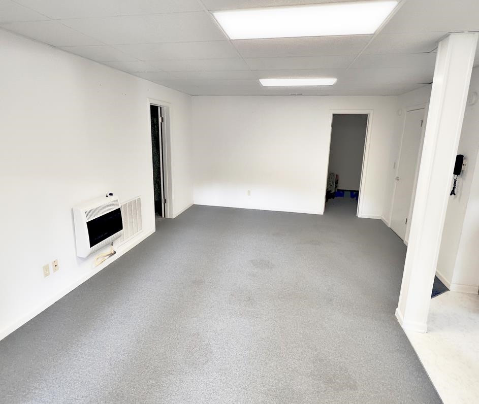 795 Lost Creek Boat Dock Road Decaturville, TN 38329 - Photo 20 of 34 a view of a kitchen with a sink and a fireplace