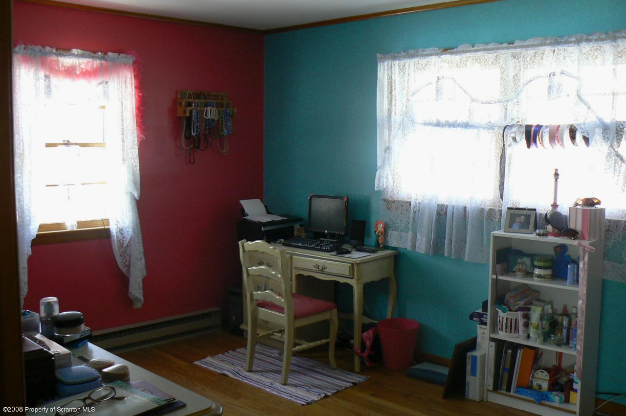 85 Stove Pipe Road Waymart, PA 18472 - Photo 7 of 21 a room with furniture and a window