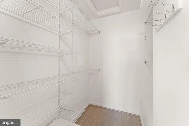 a view of small space with racks on the wall