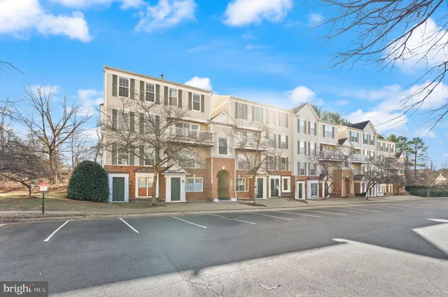 a view of a building with a street