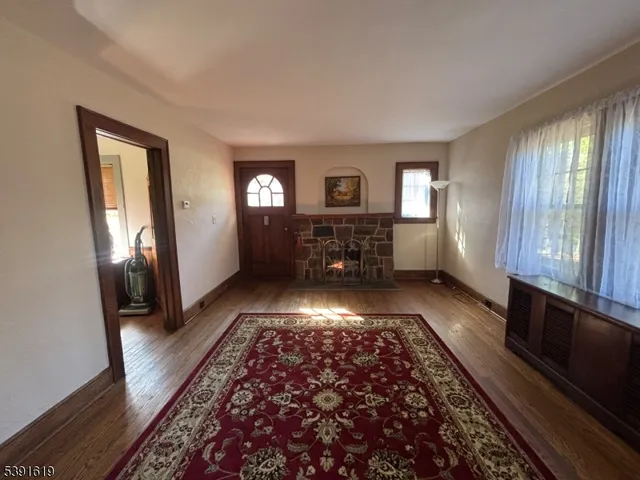 a view of gallery with wooden floor