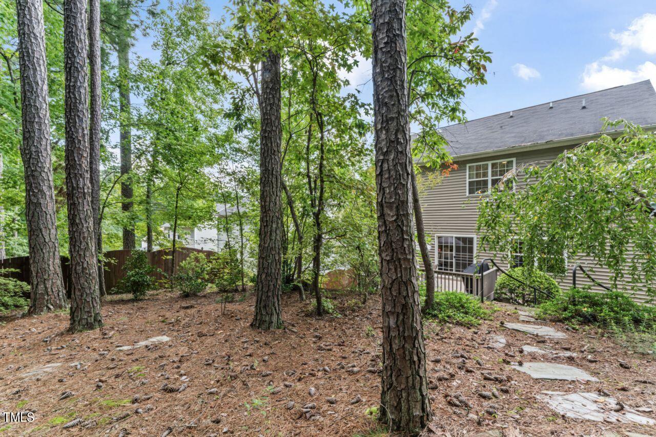 4522 Shady Side Lane Durham, NC 27713 - Photo 15 of 28 a view of a house with a backyard