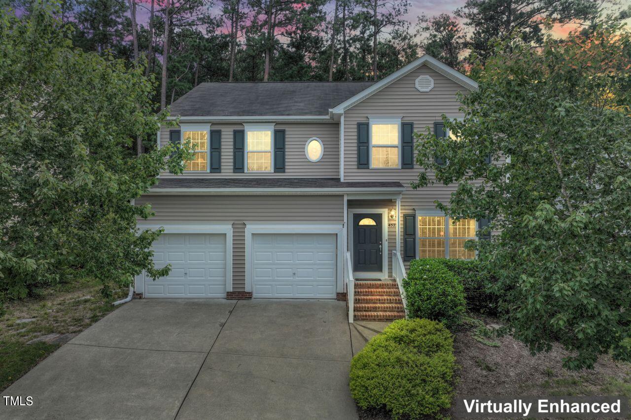 4522 Shady Side Lane Durham, NC 27713 - Photo 18 of 28 a front view of a house with garden