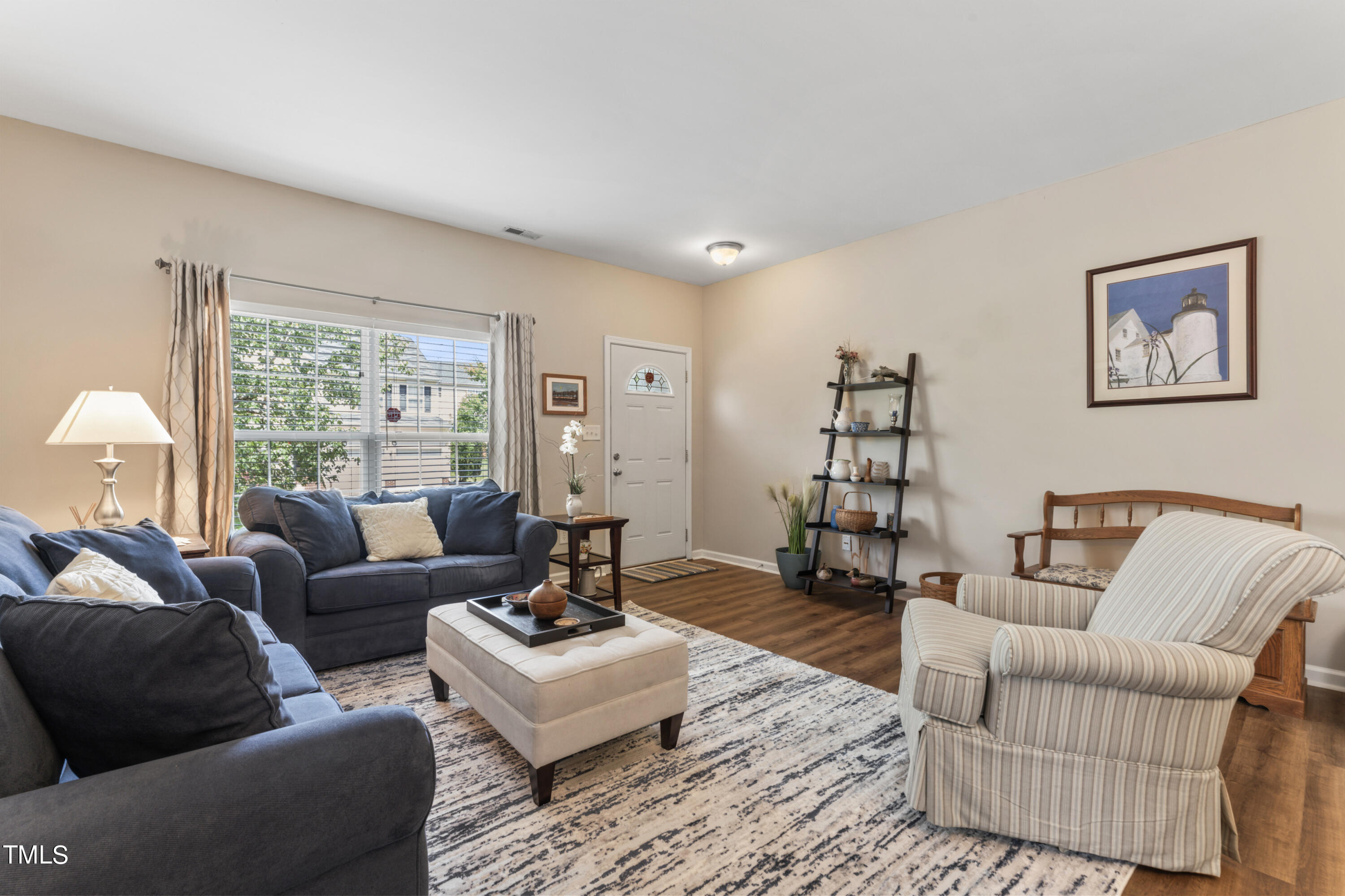 4522 Shady Side Lane Durham, NC 27713 - Photo 19 of 28 a living room with furniture and a large window