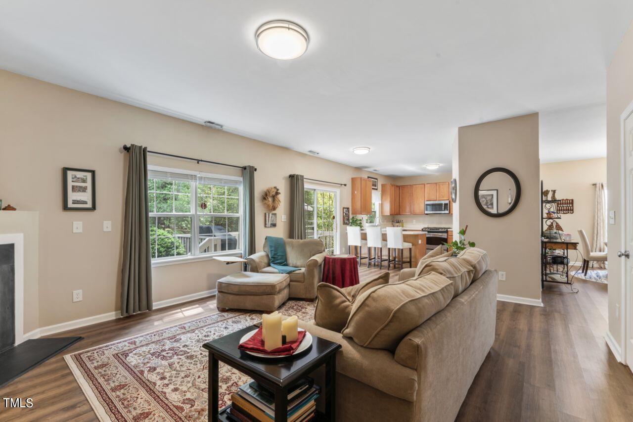 4522 Shady Side Lane Durham, NC 27713 - Photo 6 of 28 a living room with furniture and wooden floor