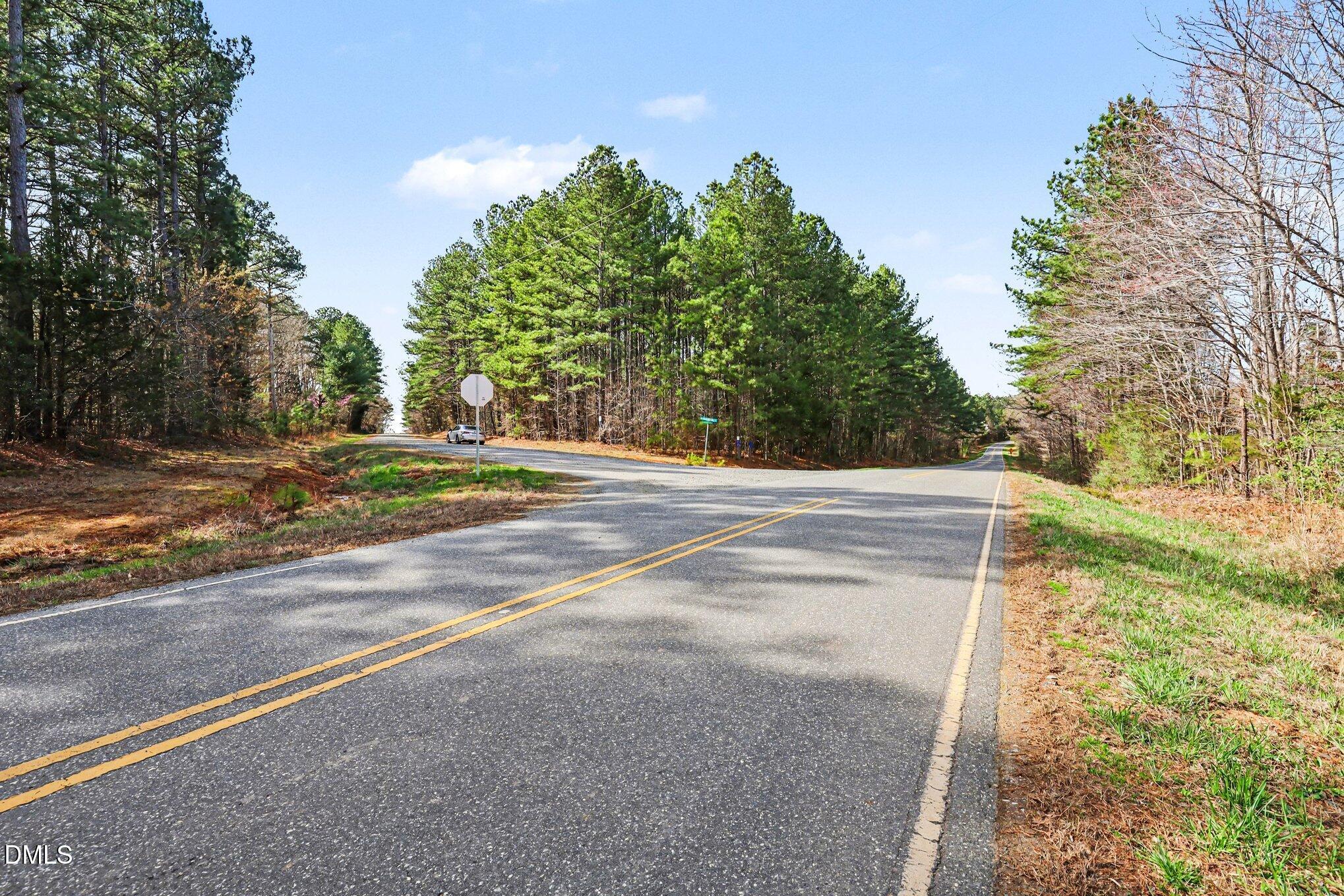 2817 Jay Shambley Road Pittsboro, NC 27312 - Photo 16 of 17 a view of a yard with an outdoor space