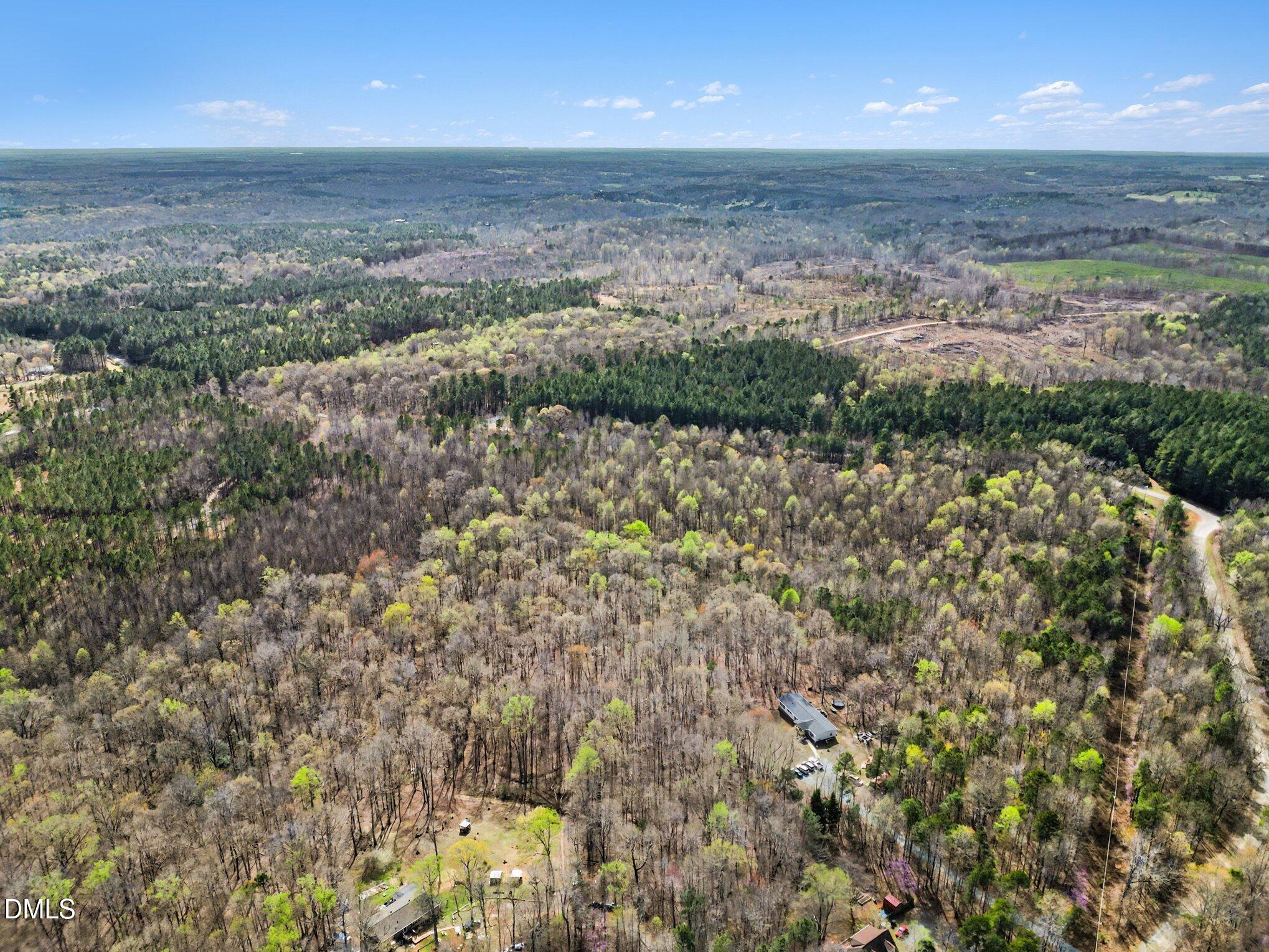 2817 Jay Shambley Road Pittsboro, NC 27312 - Photo 3 of 17 a view of an ocean and beach