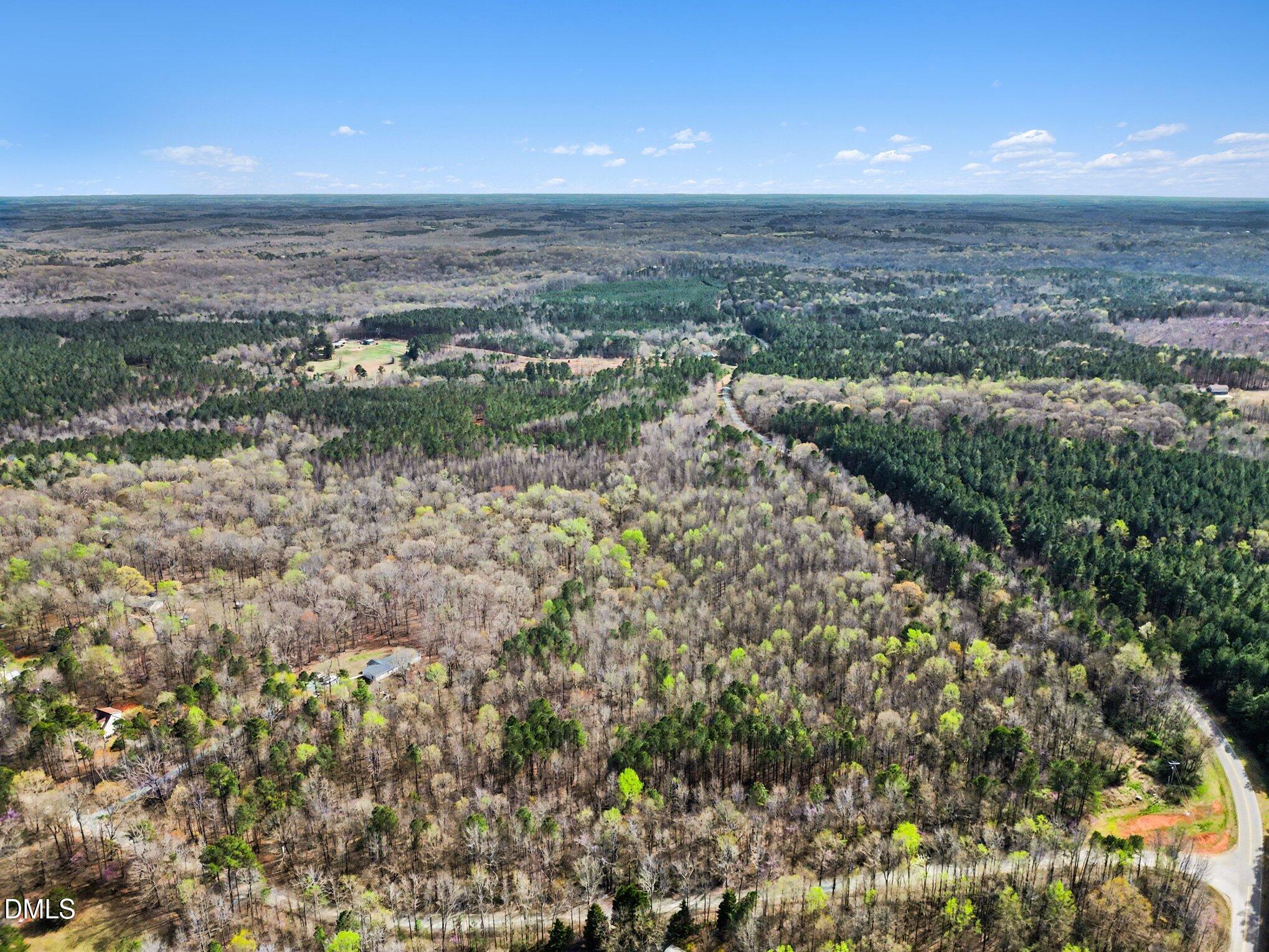 2817 Jay Shambley Road Pittsboro, NC 27312 - Photo 9 of 17 an aerial view of multiple house