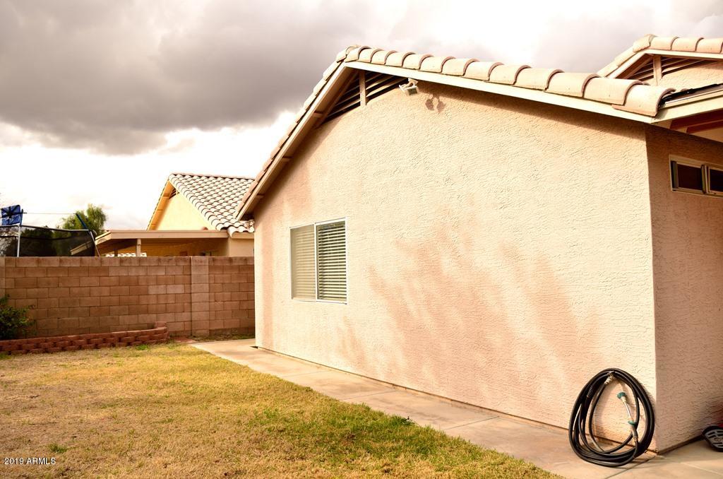 5101 Casper Road Mesa, AZ 85205 - Photo 3 of 17 a view of a garage with a sink