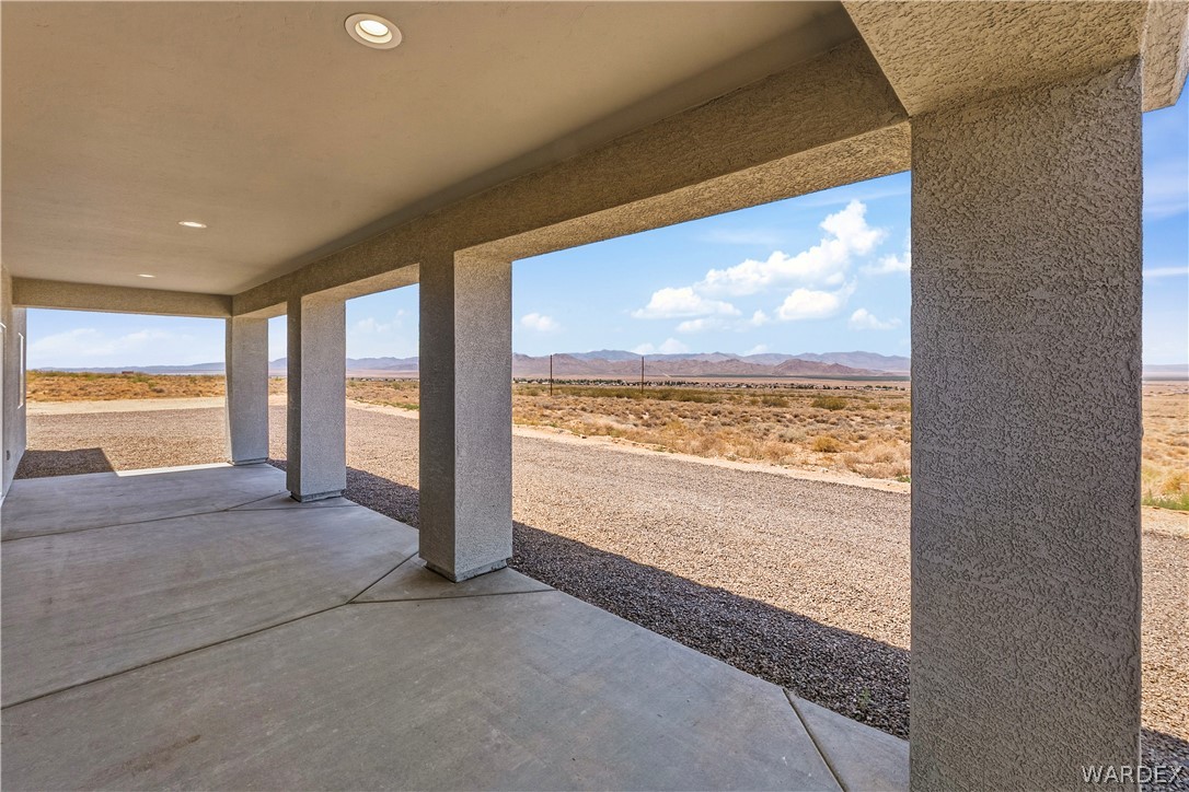 9818 North Cyrus Road Kingman, AZ 86401 - Photo 32 of 42 a view of an ocean and a floor to ceiling window
