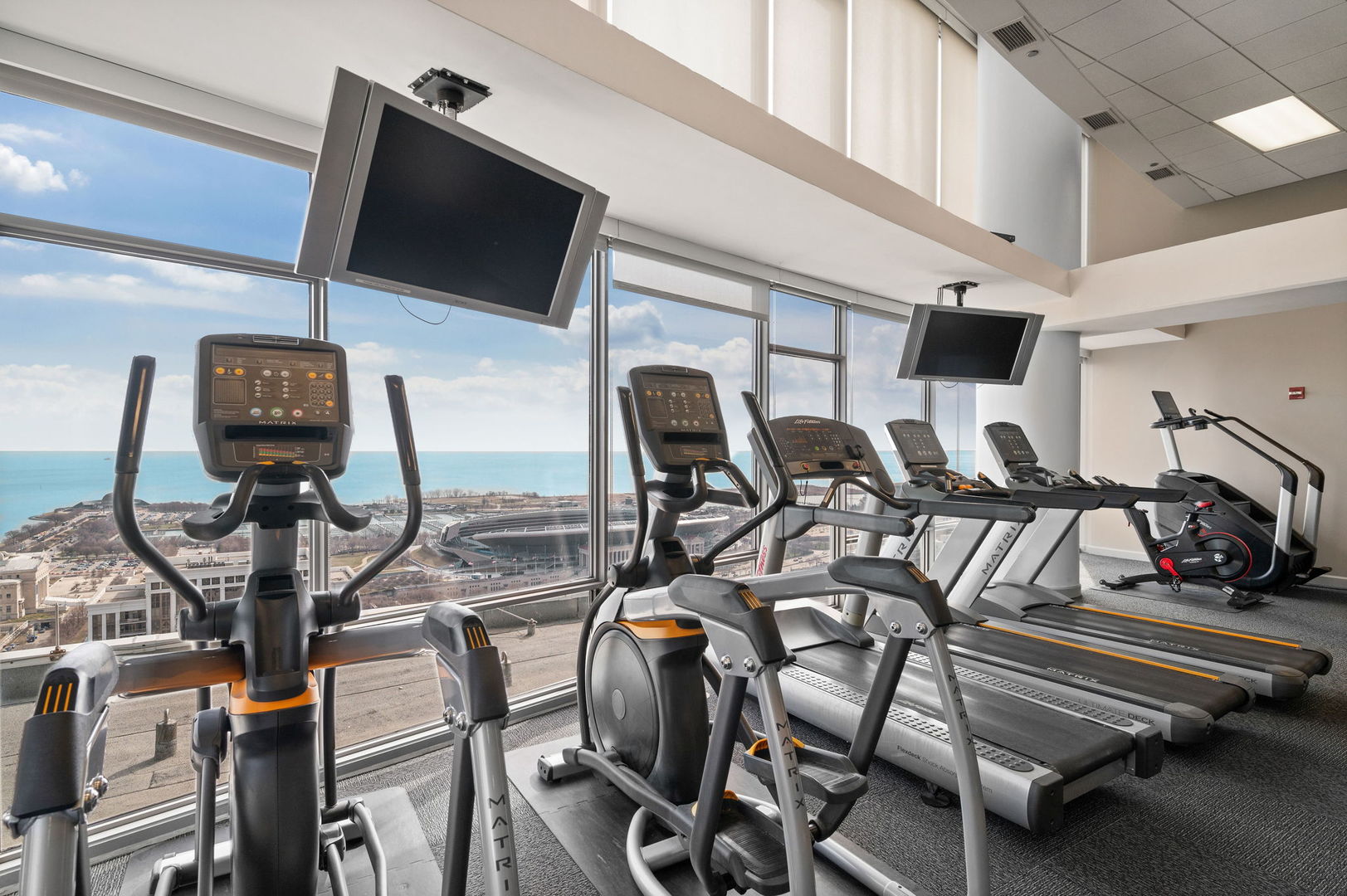 100 East 14th Street, Unit 2809 Chicago, IL 60605 - Photo 22 of 24 a view of a room with gym equipment
