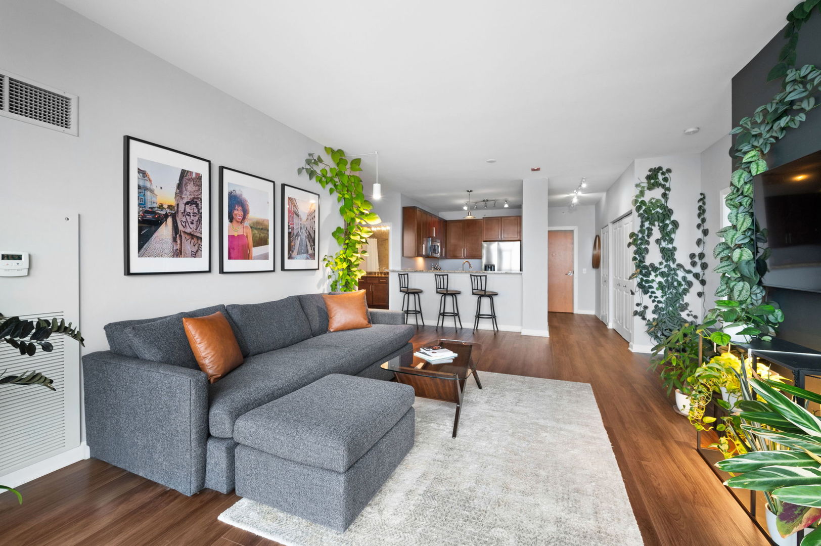 100 East 14th Street, Unit 2809 Chicago, IL 60605 - Photo 6 of 24 a living room with furniture and a large window