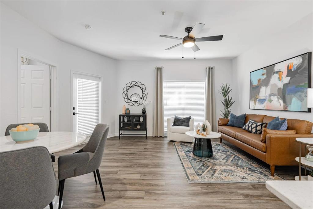 1600 North 9th Street, Unit C1 Midlothian, TX 76065 - Photo 19 of 40 a living room with furniture and wooden floor