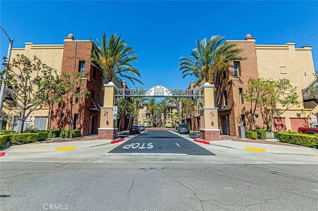 a view of street with small buildings