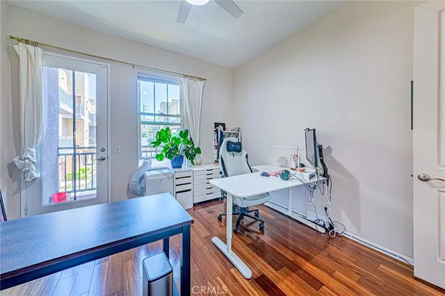 a view of a workspace with furniture