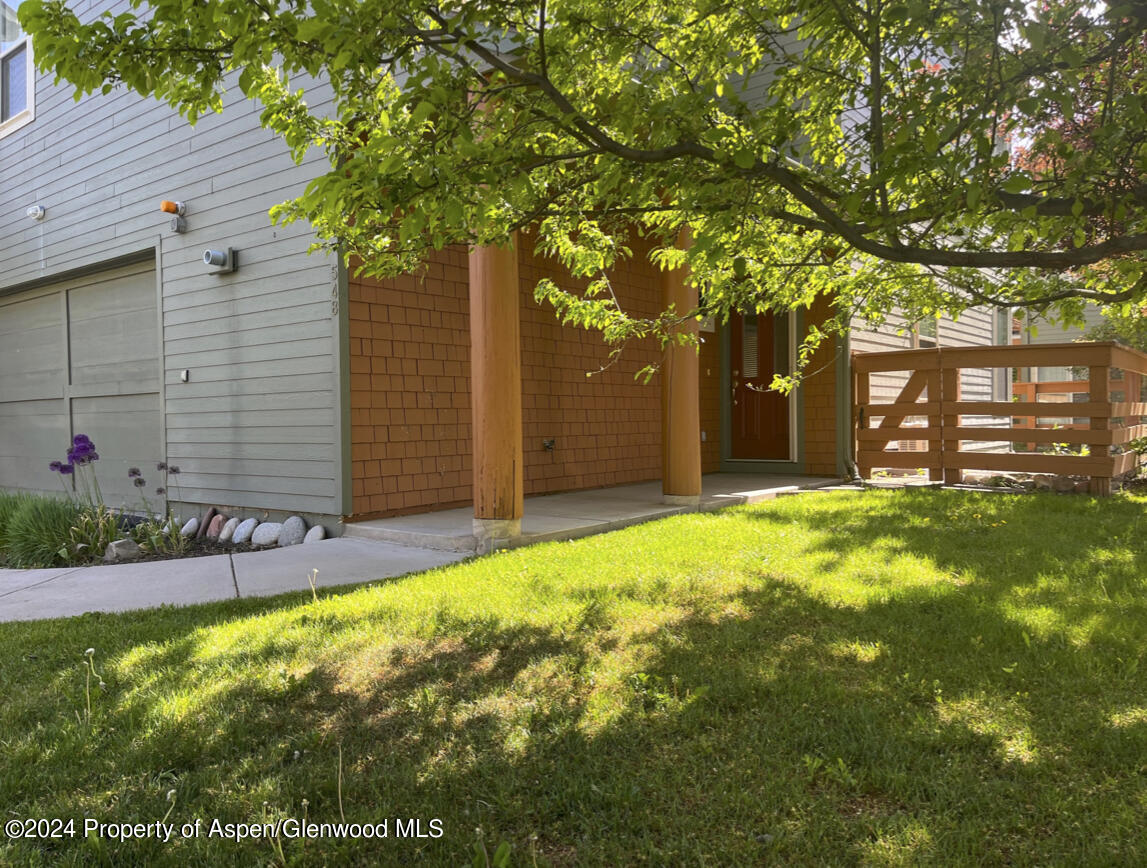 548 Evans Court Basalt, CO 81621 - Photo 21 of 24 a front view of a house with garden