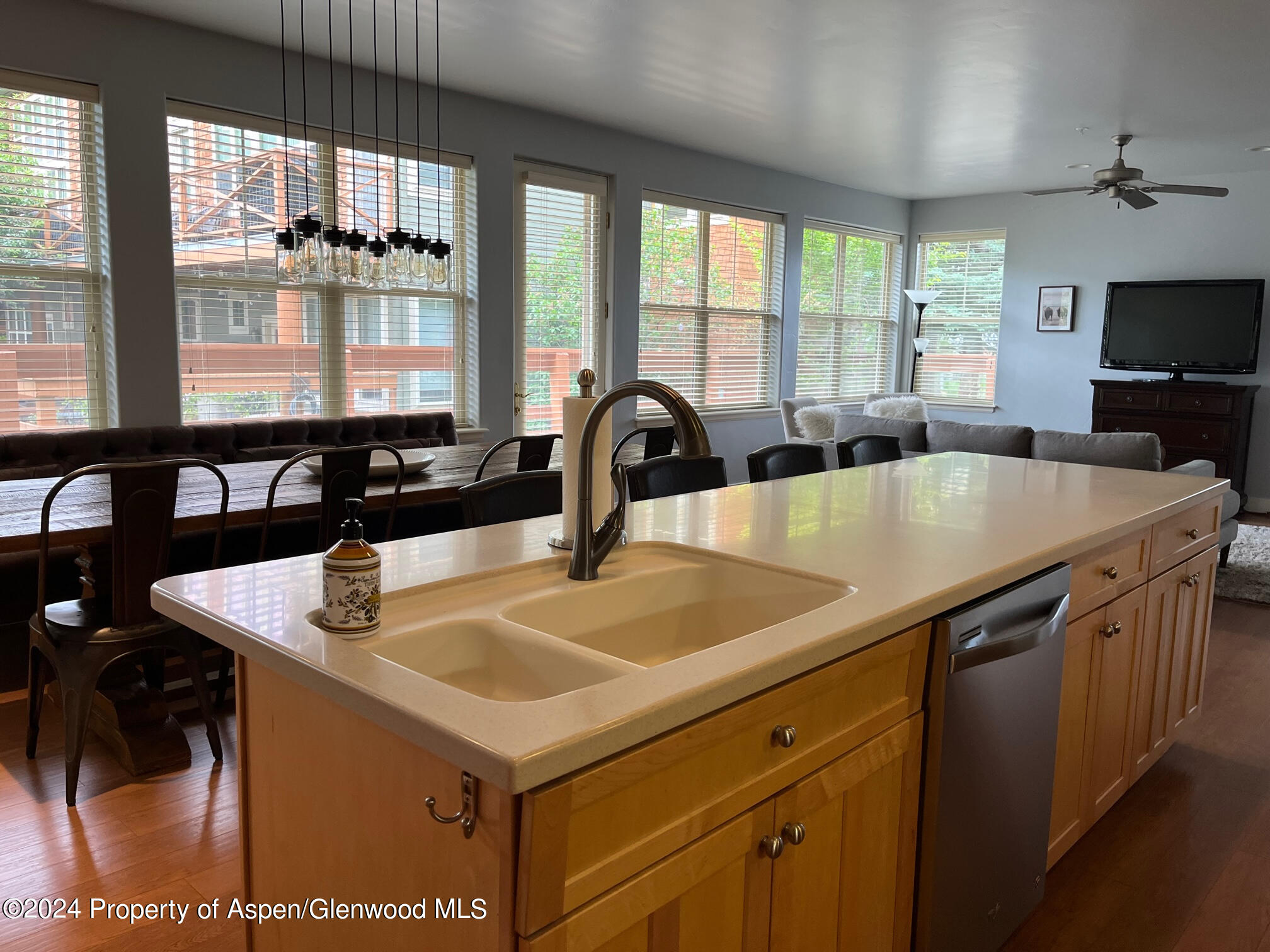 548 Evans Court Basalt, CO 81621 - Photo 3 of 24 a kitchen with a sink and large windows