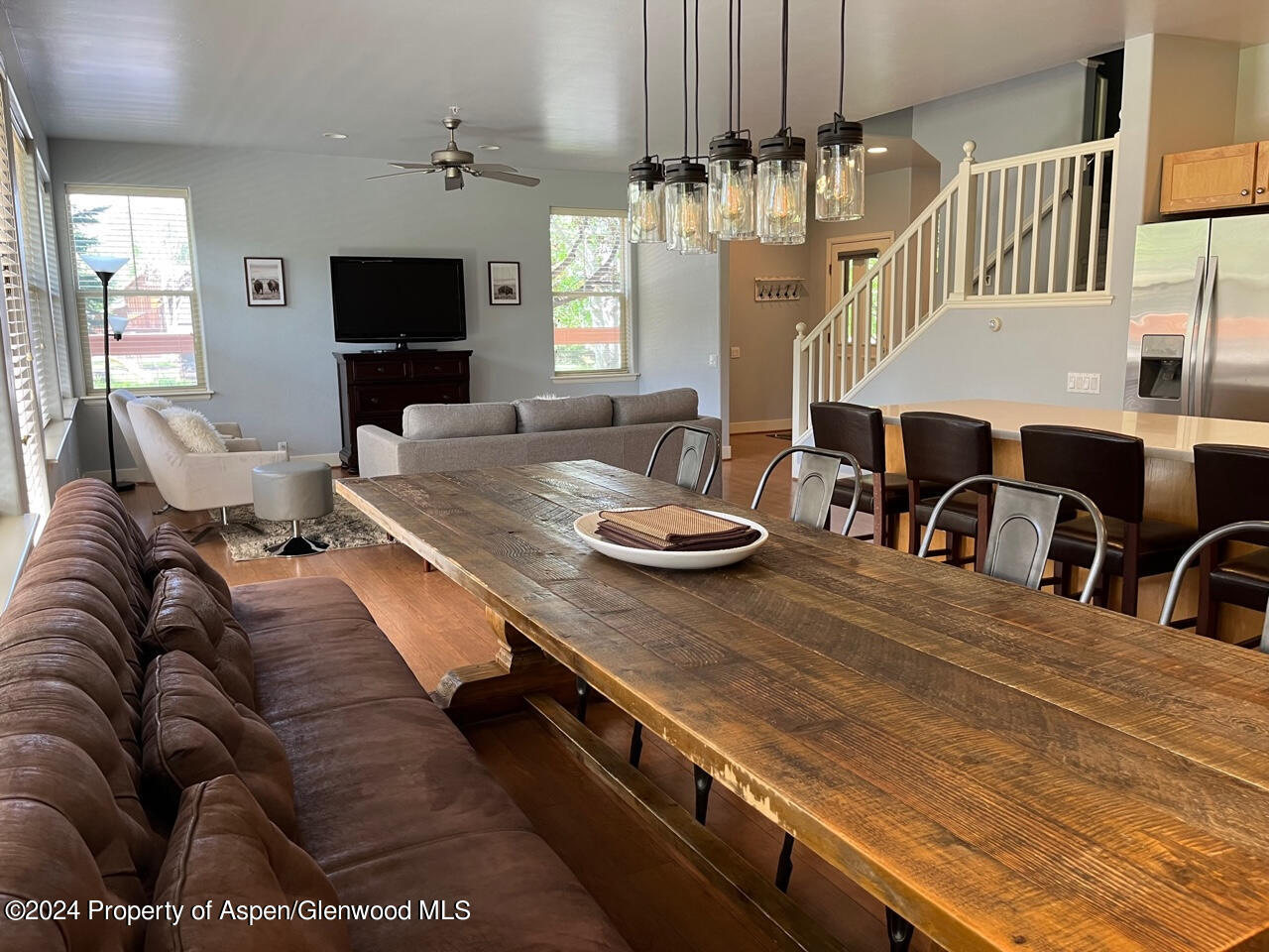 548 Evans Court Basalt, CO 81621 - Photo 4 of 24 a living room with furniture fireplace and flat screen tv