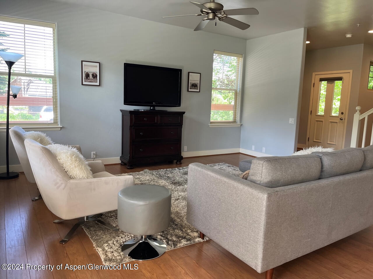 548 Evans Court Basalt, CO 81621 - Photo 6 of 24 a living room with furniture and a flat screen tv