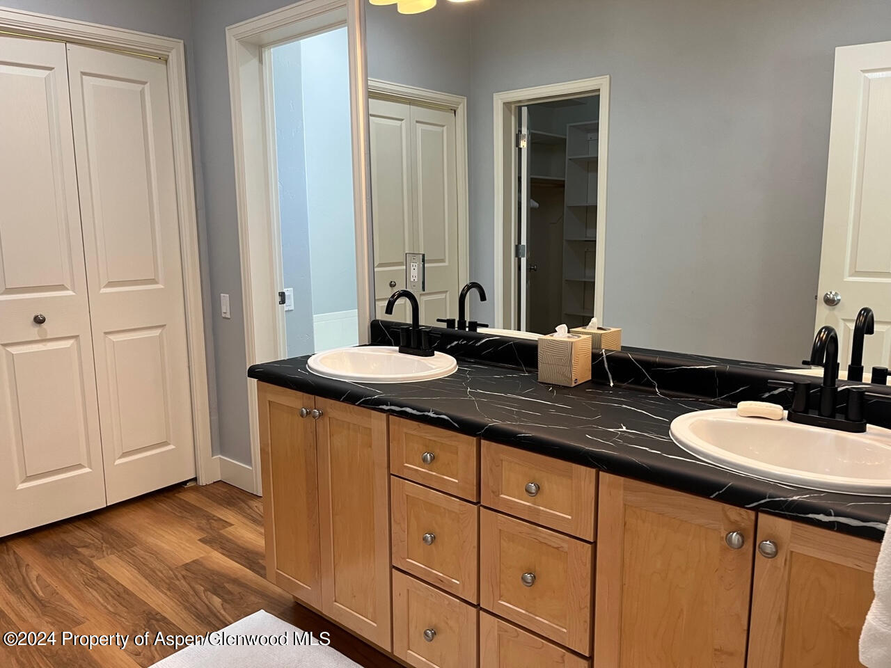 548 Evans Court Basalt, CO 81621 - Photo 10 of 24 a bathroom with 2 sink and a mirror