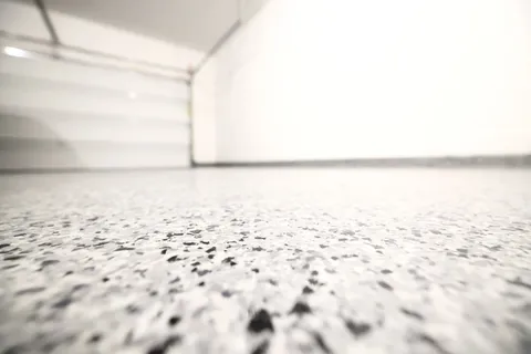 a bedroom with a large bed and a ceiling fan