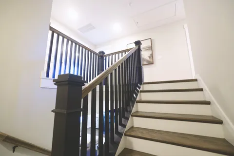 a bedroom with a bed and a walk in closet