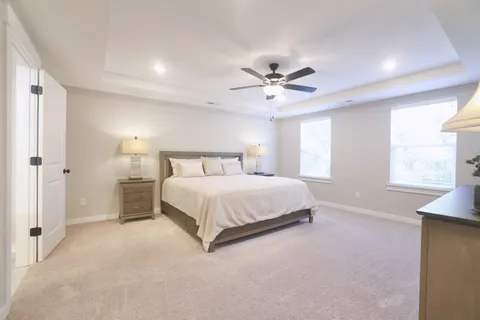 a spacious bathroom with a double vanity sink mirror and