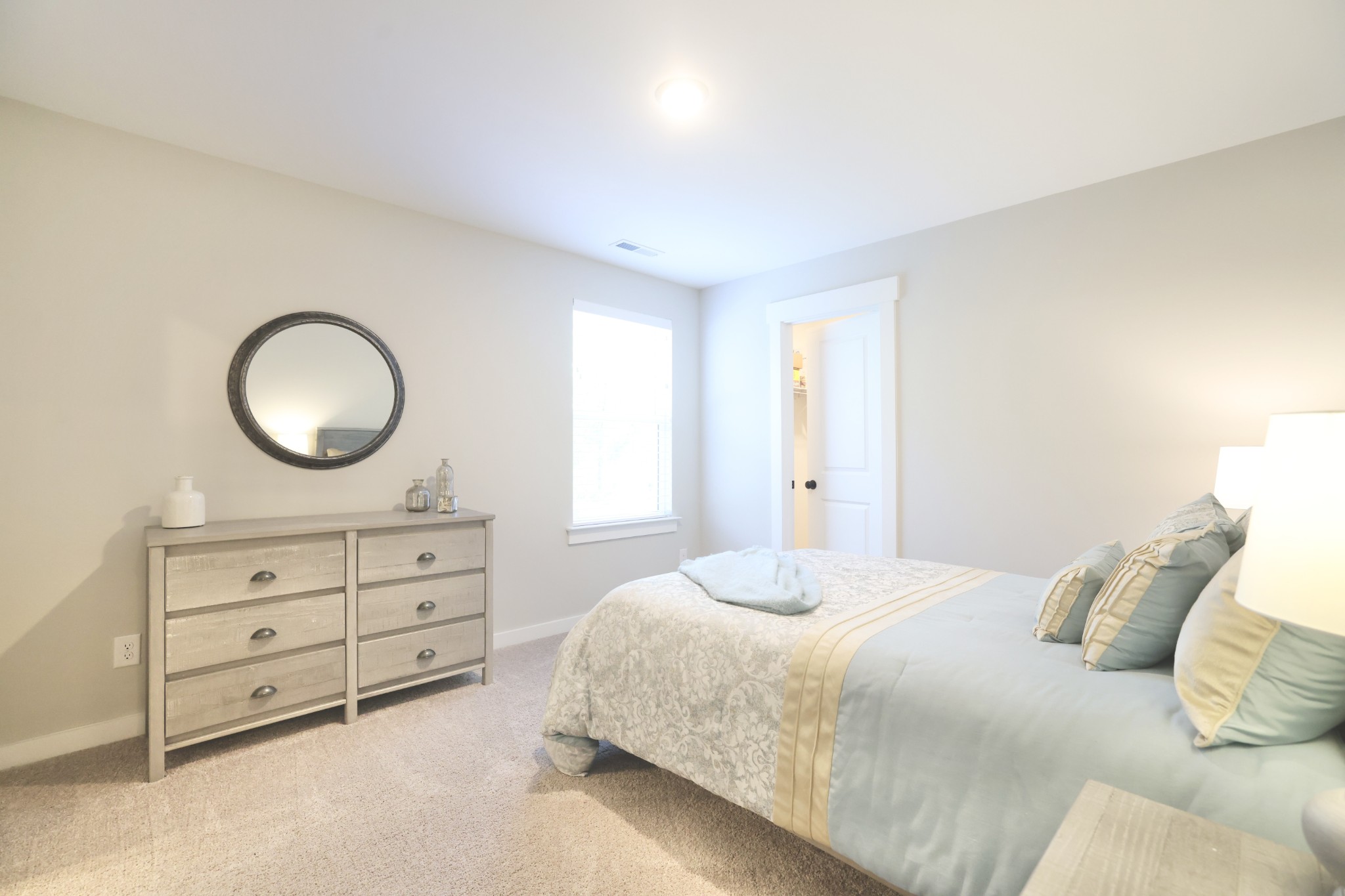 172 Cavalcade Loop Gallatin, TN 37066 - Photo 29 of 40 a bedroom with a bed and a dresser