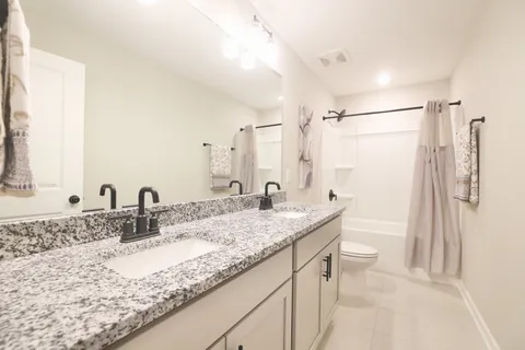 a utility room with cabinets