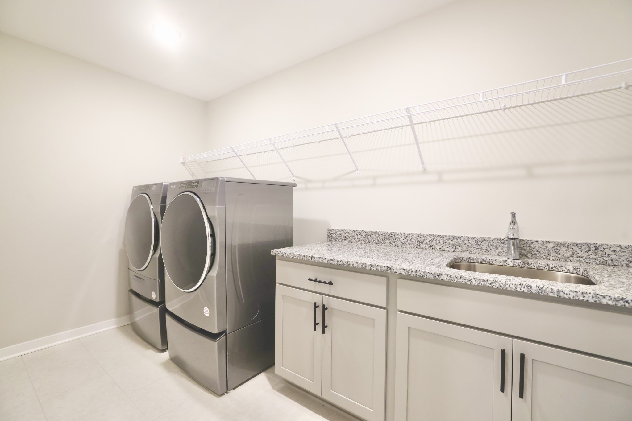 172 Cavalcade Loop Gallatin, TN 37066 - Photo 37 of 40 a utility room with cabinets