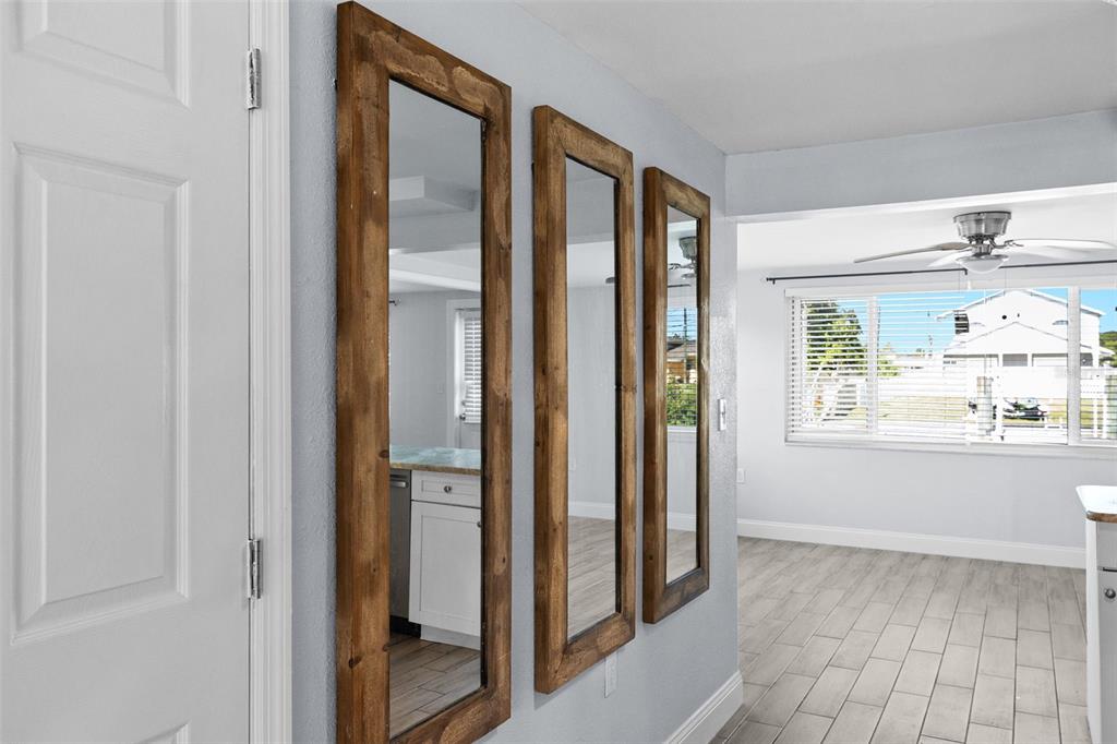 13916 Sommers Avenue Hudson, FL 34667 - Photo 11 of 46 a view of a bathroom with a bathtub and a window