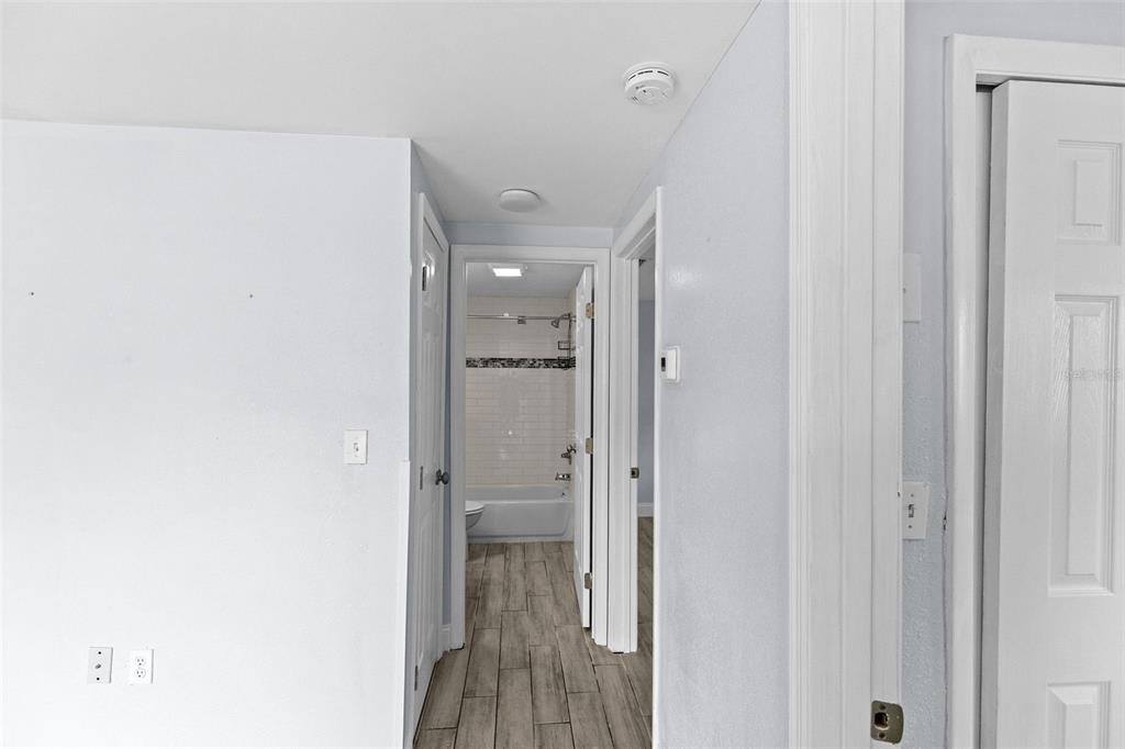 13916 Sommers Avenue Hudson, FL 34667 - Photo 22 of 46 a view of a bathroom from a hallway