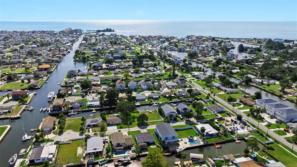 13916 Sommers Avenue Hudson, FL 34667 - Photo 4 of 46 an aerial view of a city