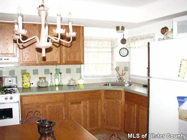 148 Rudy Frank Rd Extension Shandaken, NY 12480 - Photo 4 of 10 a bathroom with a sink and a mirror