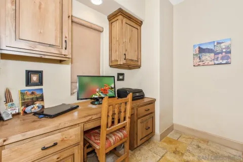 a kitchen with stainless steel appliances granite countertop a sink dishwasher stove and cabinets