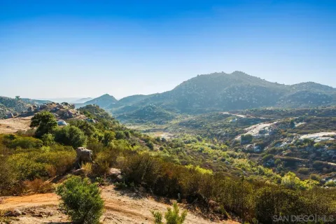 a view of mountain view with mountains in the background