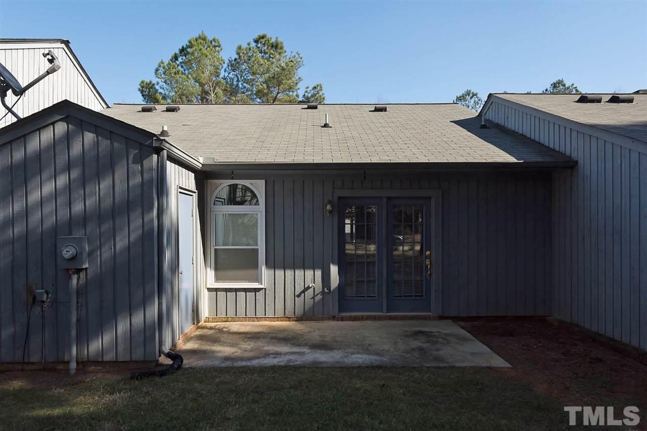 7606 Ladden Court Raleigh, NC 27615 - Photo 16 of 16 a backyard of a house