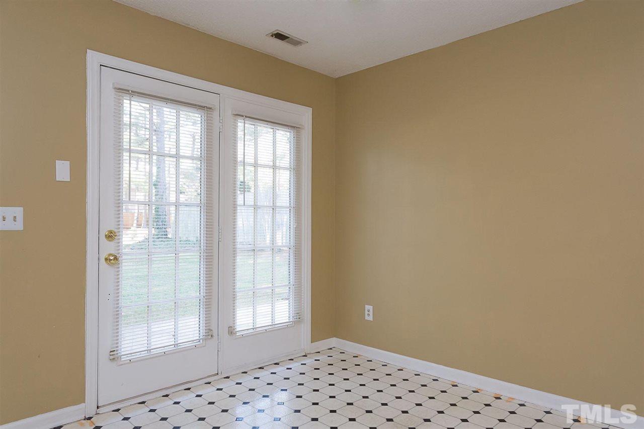 7606 Ladden Court Raleigh, NC 27615 - Photo 8 of 16 a view of an empty room