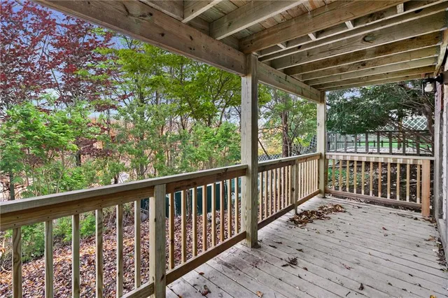a view of porch with wooden floor