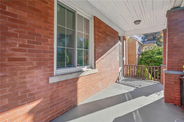 a view of house with large windows