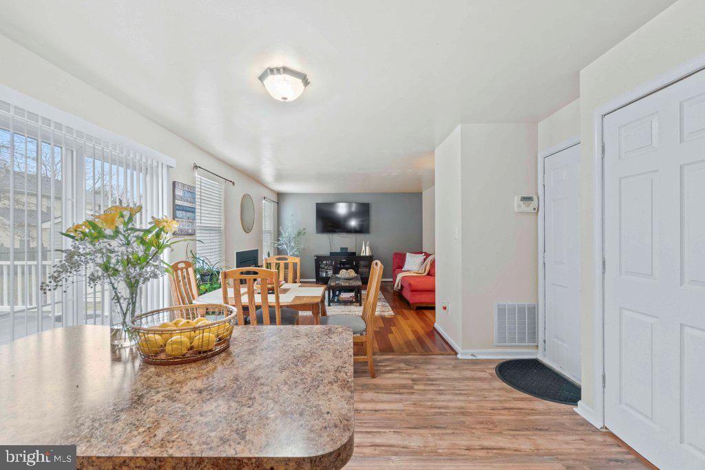 4305 Silver Spring Road Perry Hall, MD 21236 - Photo 19 of 48 a living room with furniture and a wooden floor