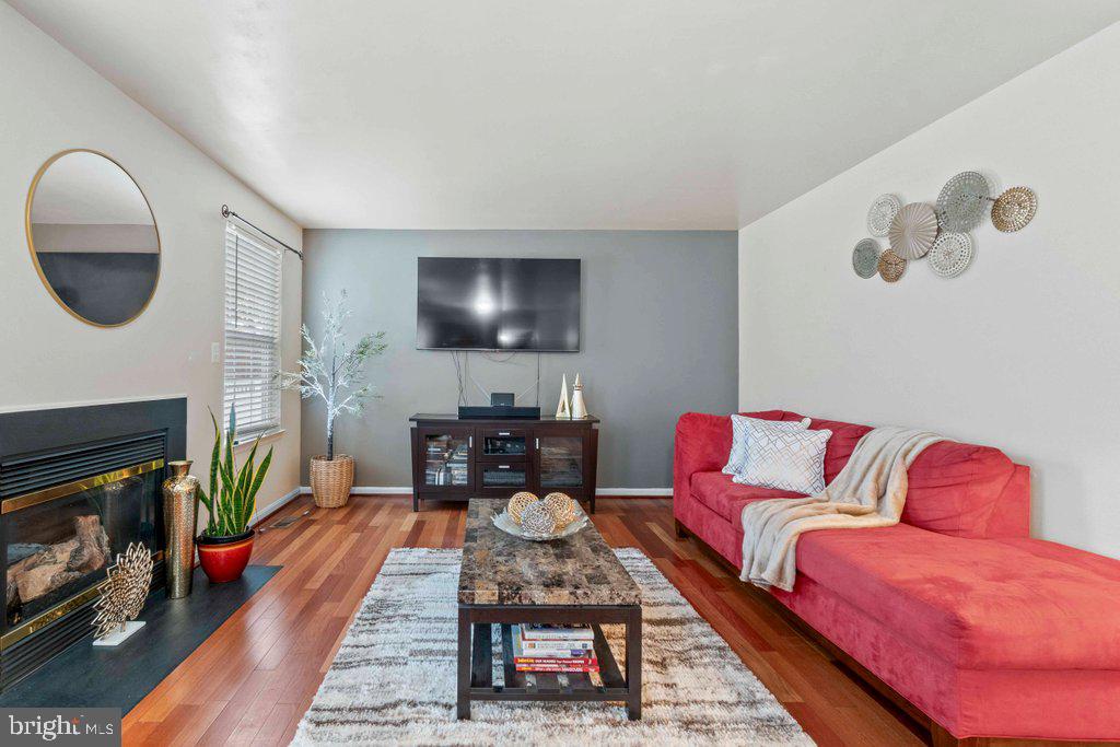 4305 Silver Spring Road Perry Hall, MD 21236 - Photo 20 of 48 a living room with furniture and a fireplace