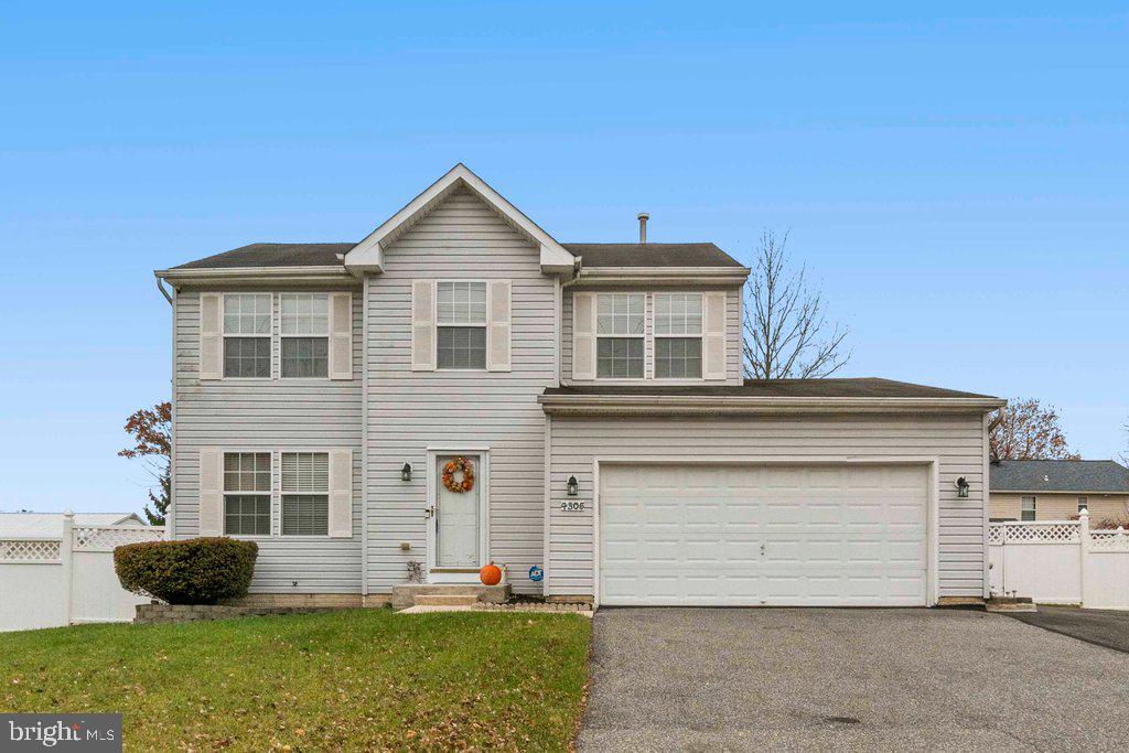 4305 Silver Spring Road Perry Hall, MD 21236 - Photo 2 of 48 a front view of a house with a yard