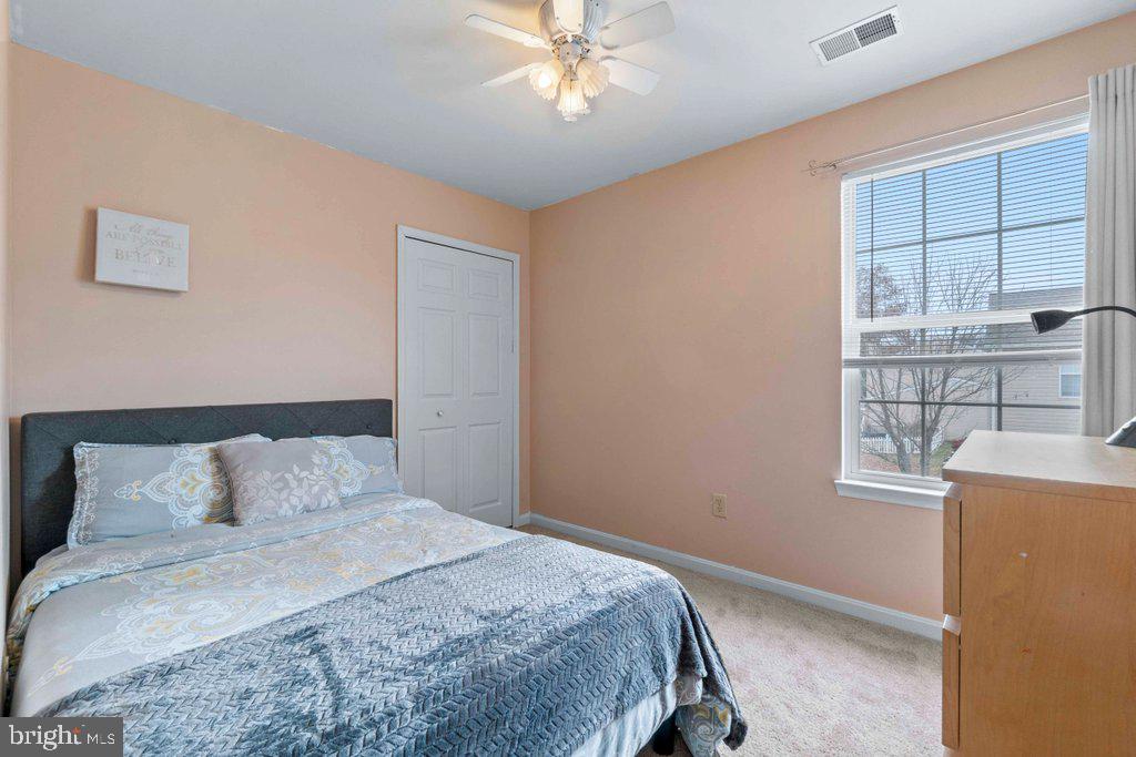 4305 Silver Spring Road Perry Hall, MD 21236 - Photo 29 of 48 a bedroom with a bed and window